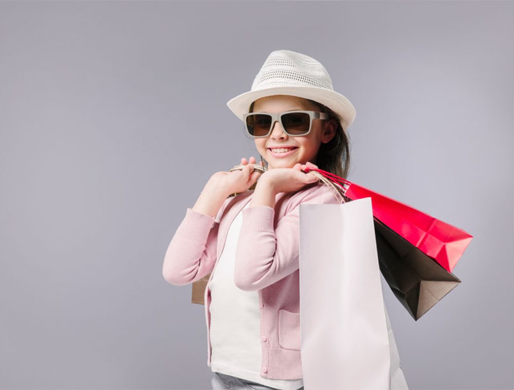 Shopper holding shopping bags